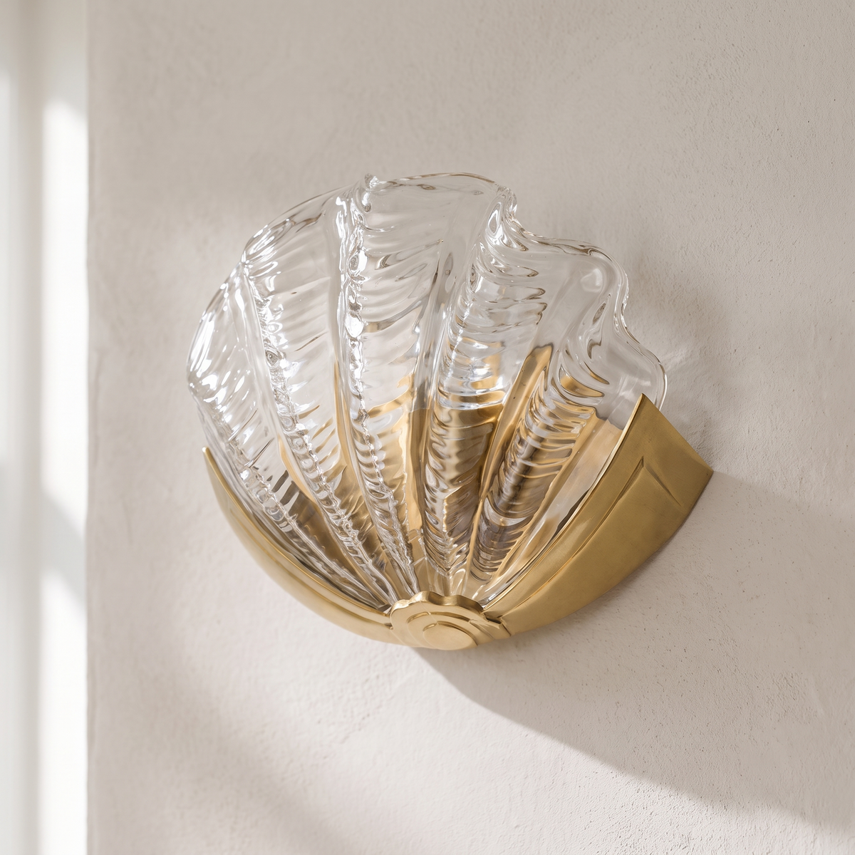 Sculpted glass on a brass mount