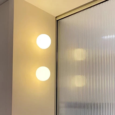 round glass wall sconce
